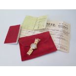 A Cartier 18K Gold Ladies Wristwatch with quartz movement, papers dated 1.4.87 and leather wallet