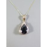 A 9ct Gold Sapphire and Diamond Tear Drop Pendant, 22mm drop and on 9ct chain, 2.2g