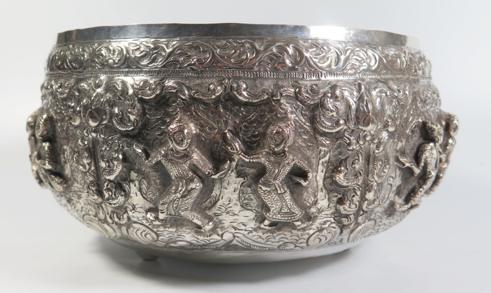 A Large Asian Silver Bowl with repoussé decorated scenes of dancers, engraved mark to base, 892g, 25 - Image 3 of 5