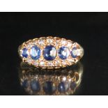 An 18ct Gold Sapphire and Diamond Ring, size R, 3.7g