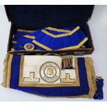 A Masonic Yorkshire West Riding Apron and Sash with 'jewel' and in leather case