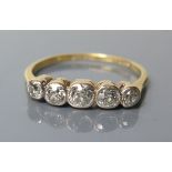 An 18ct Gold and Platinum Five Stone Diamond Ring, size P.5, 2.6 g