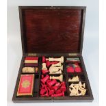 An Ivory Chess Set, kings 85mm pawns 35mm, counters etc in rosewood box