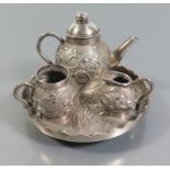 A Chinese Silver Doll's House Miniature Tea Set with tray, Luen Hing, 49 g tray 6 cm diam.