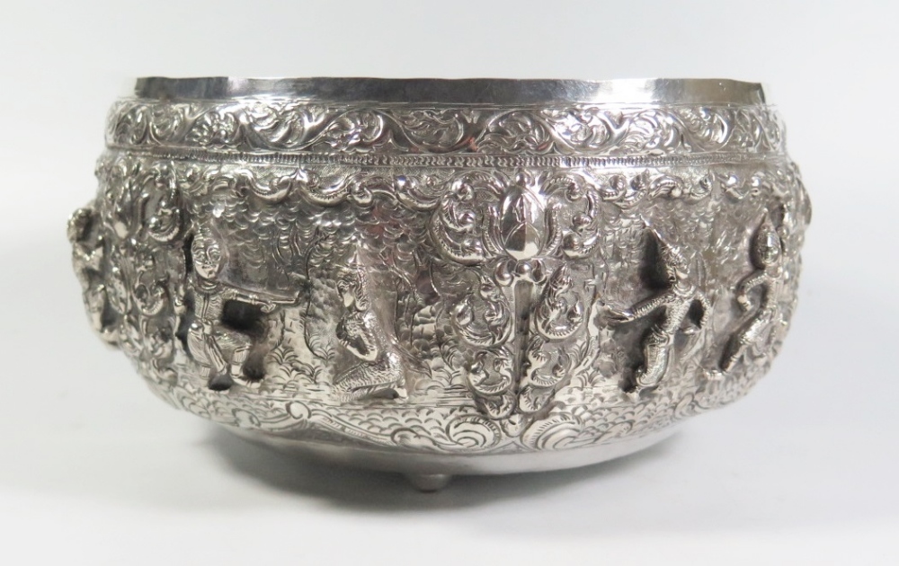 A Large Asian Silver Bowl with repoussé decorated scenes of dancers, engraved mark to base, 892g, 25 - Image 2 of 5
