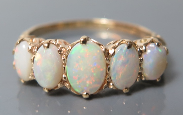 An Opal Five Stone Ring, size Q.5, 3.1 g