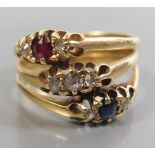 An 18ct Gold Conjoined Three Shank Ruby, Sapphire and Diamond Ring, size N.5, 6.1g