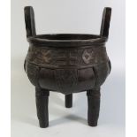 A Chinese Archaic Style Bronze Censer raised on tripod feet, 15cm diam. and 21.5cm high, 2980 g