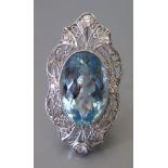 A Large Aqua Marine and Diamond Marquis Ring in a filigree white metal setting