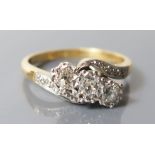 A Diamond Twist Three Stone Ring, size K.5, 3.4 g
