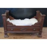 A Nineteenth Century Doll's Bed, 82 x 38 cm