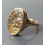 A 9ct Gold Ring with Hinged and Engraved Top, size R.5, 6.5 g