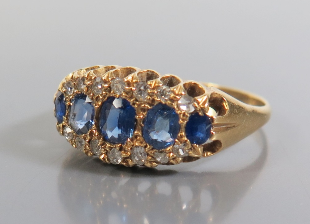 An 18ct Gold Sapphire and Diamond Ring, 1919, size R, 3.7g