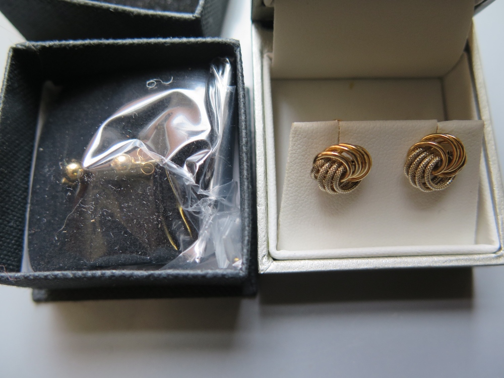 Two Pairs of 9ct Gold Earrings in H. Samuel boxes