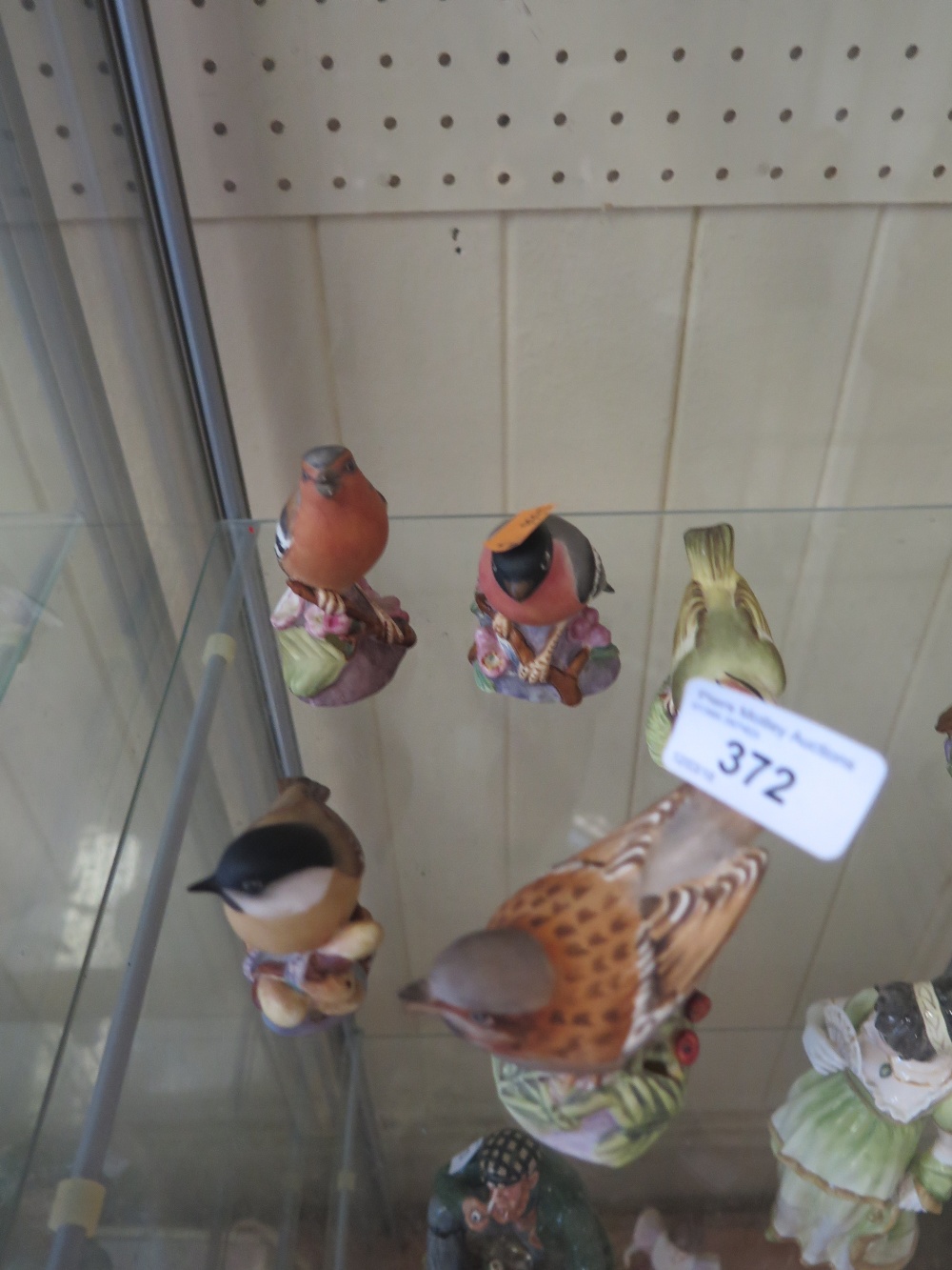 Five Royal Worcester Birds: Chaffinch, Gold crest, Bullfinch, Marsh Tit and Sparrow