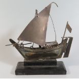 A White Metal Model Boat, 16 cm long