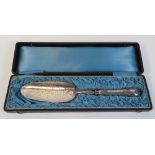 A Cased French Silver Server with chased foliate decoration