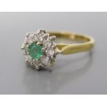 An 18ct Gold Emerald and Diamond Ring, size M, 3.2g