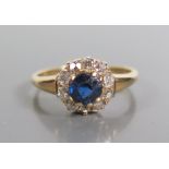 An 18ct Gold Sapphire and Diamond Cluster Ring, size N, 3.3g