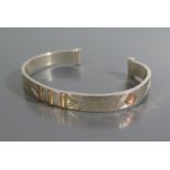 A Jamie Inglis (Devon Guild of Craftsman) Silver and Gold Bangle