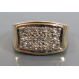 An 18ct Gold and Diamond Dress Ring, stamped E.65, size N.5, 7.6g