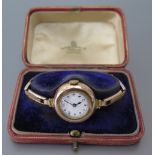 A Ladies 9ct Gold Cased Wristwatch with enamel dial 9ct gold bracelet, the case assayed in 1918,