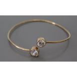 A 9ct Gold and Cubic Zirconia Bangle, 5.2g gross