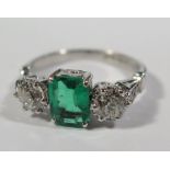 A Colombian Emerald and Diamond Three Stone Ring with GCS Gemological Certificate stating the .