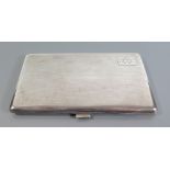 A Sterling Silver Cigarette Case with engine turned decoration, 211g