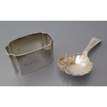A Victorian Silver Caddy Spoon with scallop bowl Exeter 1875, Josiah Williams & Co. AND Sheffield