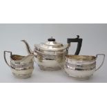 A George V Silver Three Part Tea Set with chased foliate scroll decoration, Birmingham 1924, Ellis