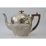 A Victorian Silver Teapot with fluted decoration, London 1892, 548g