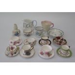 A Collection of Miniature Cups and Saucers including Belleek, Augustus Rex, Coalport, miniature