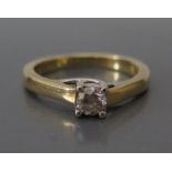 An 18ct Gold and Diamond Solitaire Engagement Ring, .25ct, size J, 3.6g