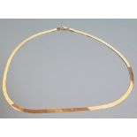 A 14K Gold Necklace 6.7g and 'nail' .6g