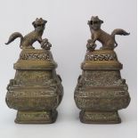 A Pair of 18th/19th Century Chinese Bronze Vases with covers, 26.5cm