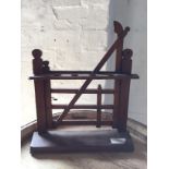 An Edwardian Novelty Wooden Pipe Rack for six pipes, in the form of a five bar gate, c.1910