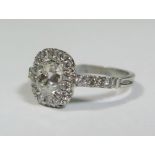 A Diamond Engagement Ring in a precious white metal setting, central stone 1.45ct (ETD. 2.15ct),