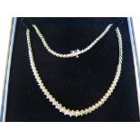 A 14K Yellow Gold and Diamond Necklace, (approx. 5ct diamonds, 26.9g