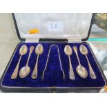 A Cased Set of Sheffield Silver Teaspoons with tongs