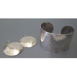 A Planished Silver Bangle and pair of matching earrings