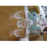 A Waterford Cut Crystal Decanter and pair of matching glasses