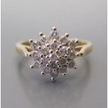 An 18ct Gold Diamond Cluster Ring (.5ct), size K, 3.7g