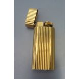 A Cartier Gold Plated Lighter, 1989, A45483