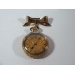 A Ladies 18ct Gold Cased Keyless Open Dial Fob Watch with chased foliate decoration, pinset