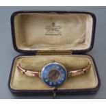 A 1920's/30's Ladies Guilloché Enamel Manual Wind Wristwatch with Connaught 9ct gold bracelet, boxed