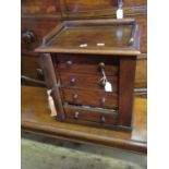 A Small Victorian Mahogany Table Top Wellington Chest