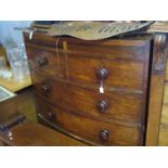 A Georgian Mahogany and Strung Bow Fronted Chest of Drawers