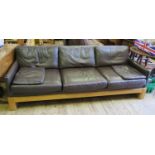 A Miles Carter Three Seater Brown Leather Sofa. Miles Carter designed furniture for the British