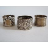 A Victorian Silver Napkin Ring decorated with putti and ribbons in a continuous landscape Birmingham